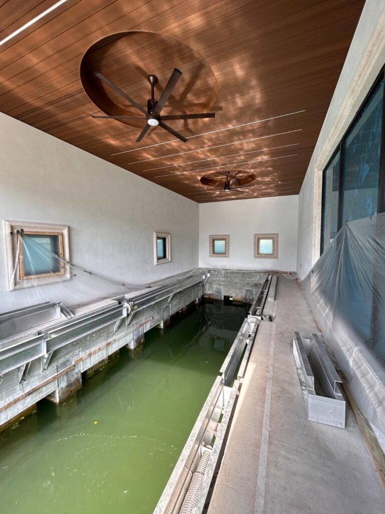 Glass detailing in boathouse design by Andrea D'Alessio
